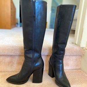 Tall black boots leather